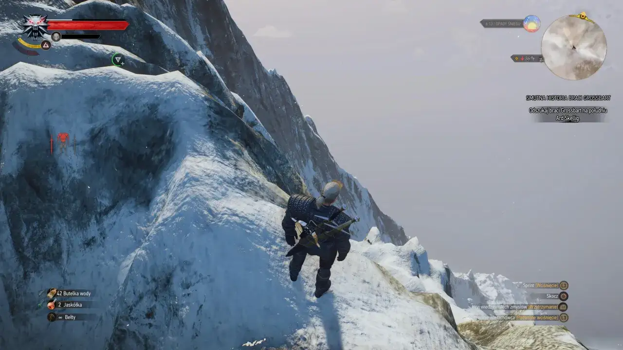 Geralt na śnieżnym zboczu, szuka śladów smutna historia braci Grossbart. W tle góry i mgła.