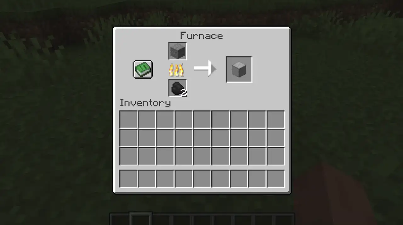 Jak zrobic gladki kamien w Minecraft: w piecu umieść kamień i węgiel, aby uzyskać gładki kamień.