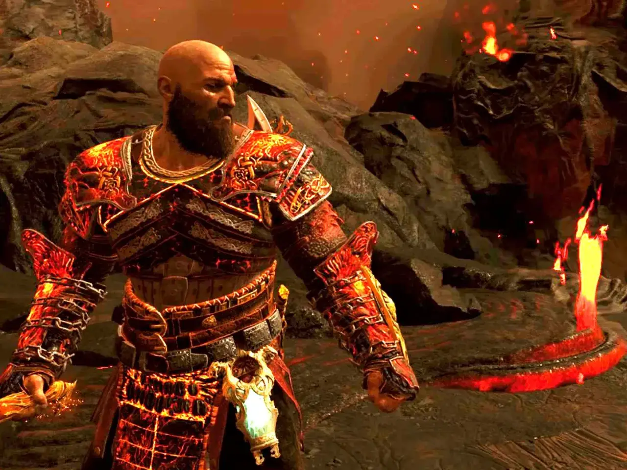 Kratos, el dios de la guerra, con armadura de fuego en Muspelheim.