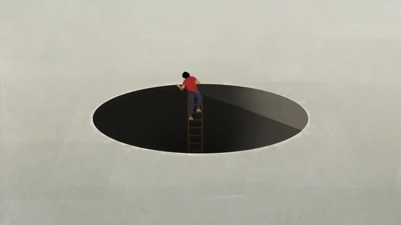 Een persoon op een ladder die naar een donkere, ovale afgrond reikt. Het voelt alsof ik val op mannen die mij afwijzen, steeds weer die donkere afgrond in.