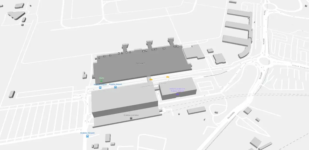 Plan lotniska Kraków-Balice z Terminalem T1, hotelem Hilton Garden Inn i drogami. W pobliżu znajduje się parking bezpłatny dla podróżnych.