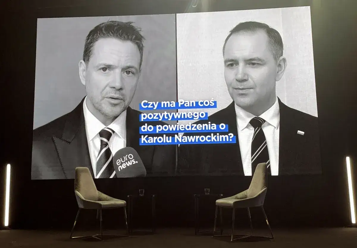 Debata polityczna w ramach kampanii wyborczej. Na ekranie pytanie do Karola Nawrockiego.