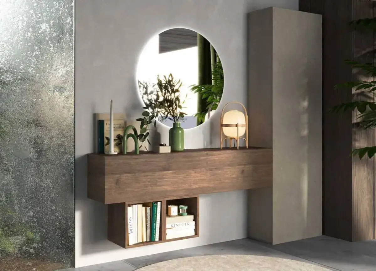 &Eacute;l&eacute;gante deco entree avec miroir rond lumineux, &eacute;tag&egrave;re en bois flottant et petite biblioth&egrave;que.
