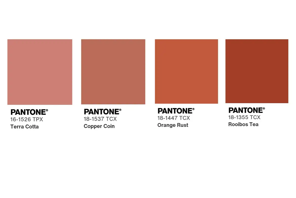 Quattro campioni di colore Pantone: Terra Cotta, Copper Coin, Orange Rust e Rooibos Tea. Un'esplorazione di tonalit&agrave; arancione antico.
