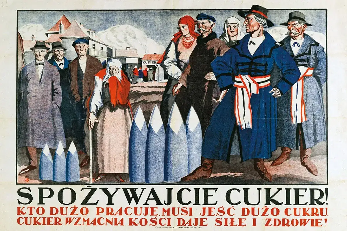 Ludzie w strojach ludowych i miejskich, przed nimi stożki cukru.