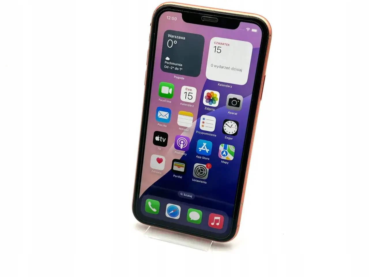 Różowy iPhone XR z widżetami pogody i kalendarza. Zastanawiasz się, do kiedy wsparcie dla tego modelu?