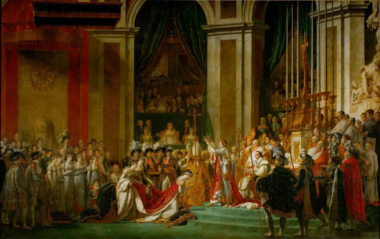 Le Sacre de Napoléon par David, une œuvre d'art grandiose. L'empereur couronne l'impératrice Joséphine devant une foule nombreuse.