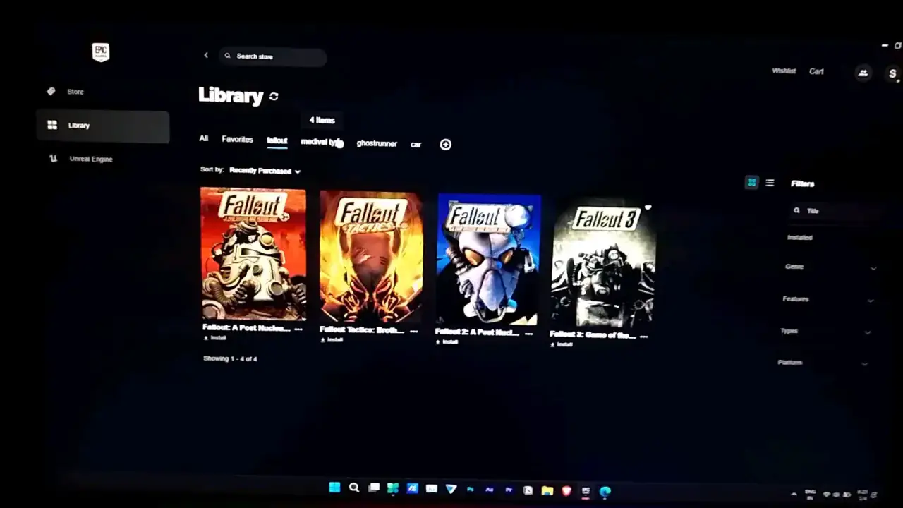 Biblioteka Epic Games z grami z serii Fallout. Widać cztery tytuły: Fallout, Fallout Tactics, Fallout 2 i Fallout 3, dostępne jako darmowe gry Epic Games.