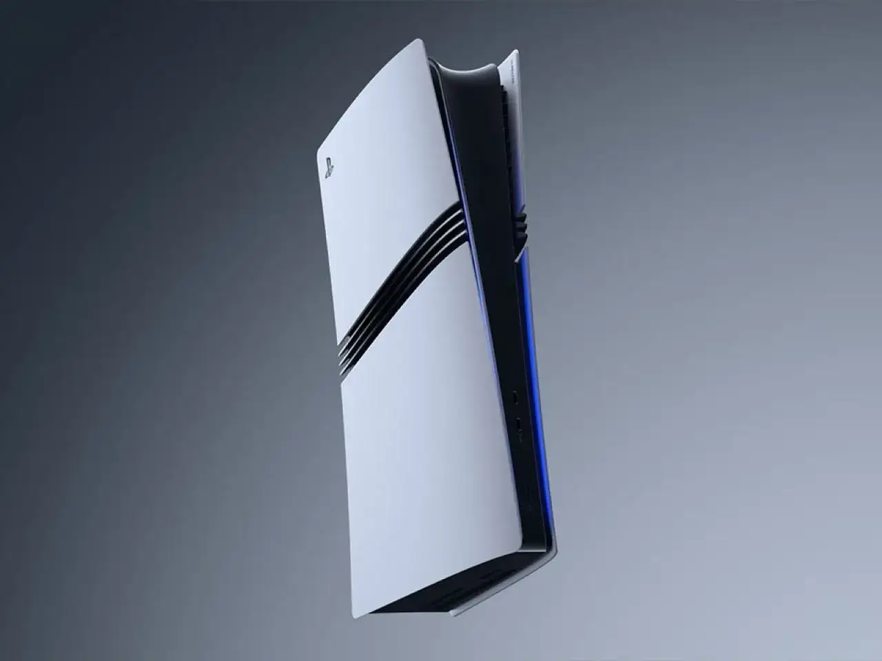 Konsola PS5 Pro, zapowiedź premiery. Futurystyczny design, biało-czarna obudowa z niebieskimi akcentami.