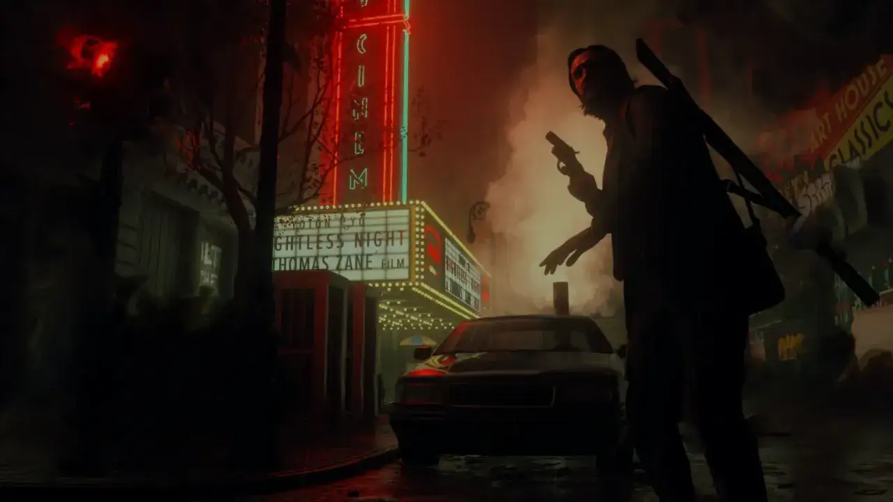 Alan Wake 2 en Steam: un hombre con arma y linterna se enfrenta a la oscuridad frente a un cine con el cartel