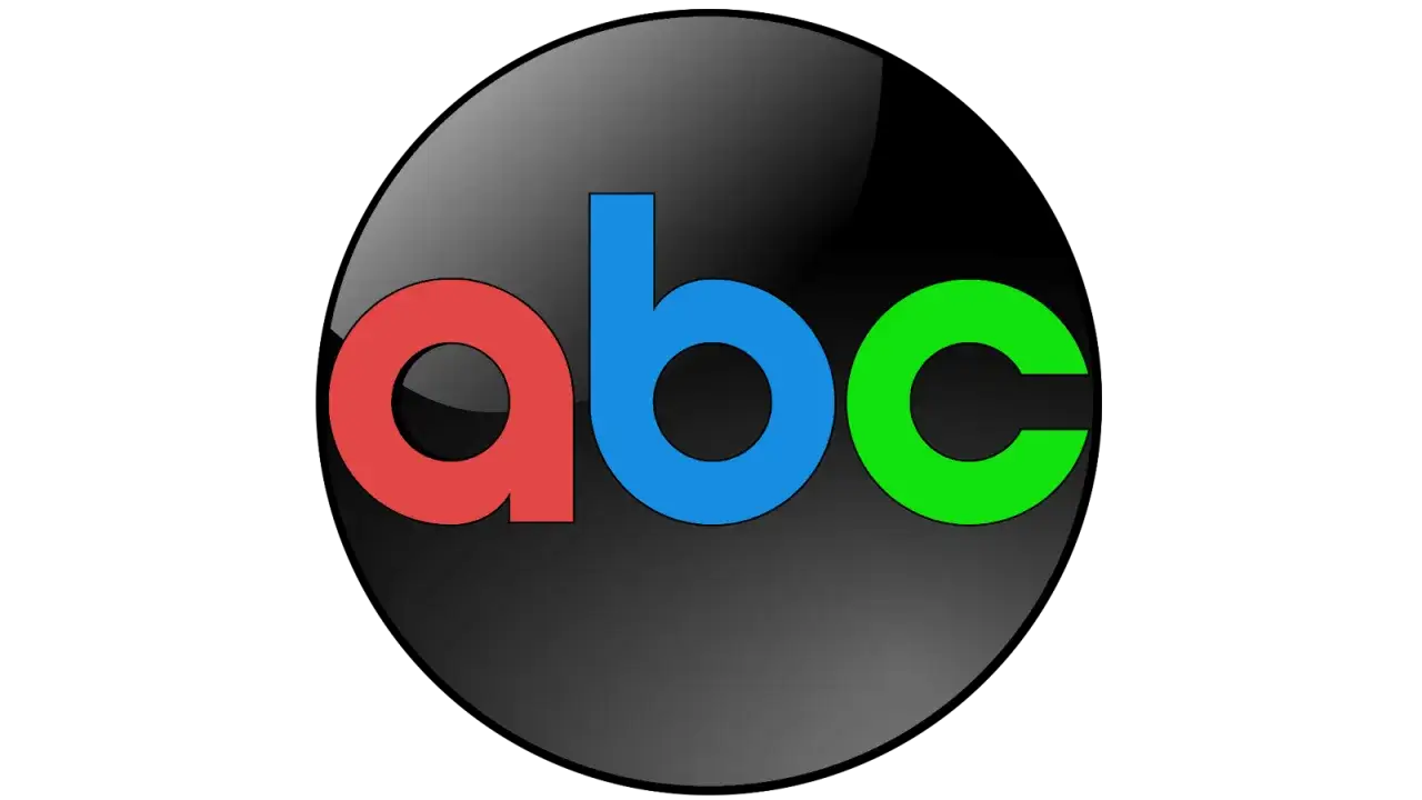 The iconic paul rand abc logo, featuring red 'a', blue 'b', and green 'c' within a glossy black circle.