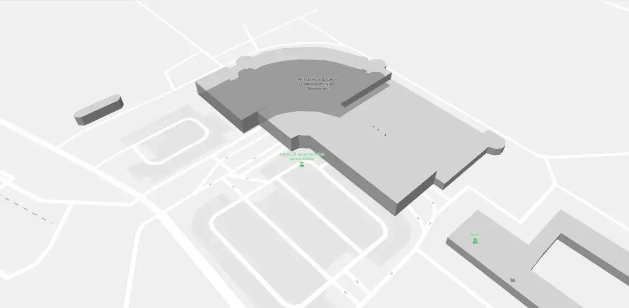 Widok 3D lotniska Szczecin-Goleniów. Widać terminal, drogi dojazdowe i wypożyczalnie samochodów.