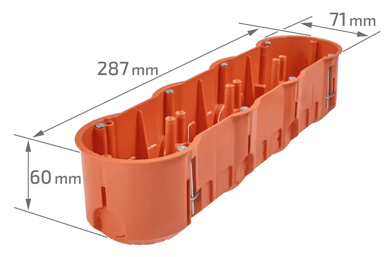 Pomarańczowa puszka elektryczna o wymiarach 287x71x60 mm. Jej głębokość wynosi 60 mm, co zapewnia przestrzeń na instalację.