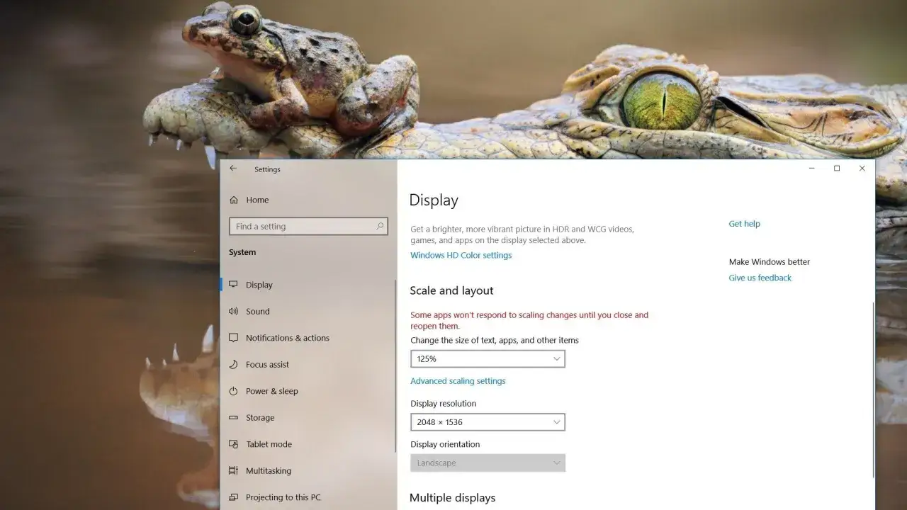 Ustawienia ekranu Windows, gdzie można zmienić skalowanie, aby powiększyć ekran. Widok menu 