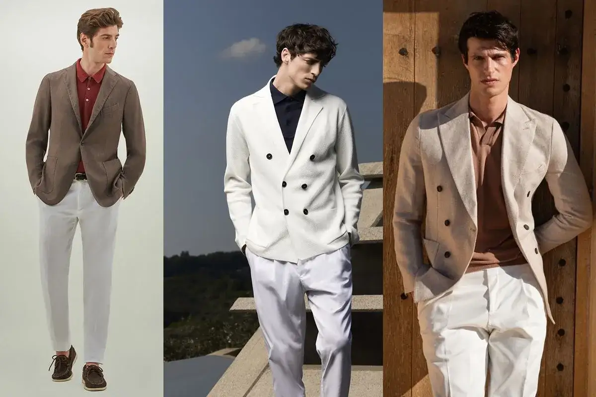 Tre uomini indossano un elegante outfit polo uomo con blazer e pantaloni chiari, perfetti per l'estate.