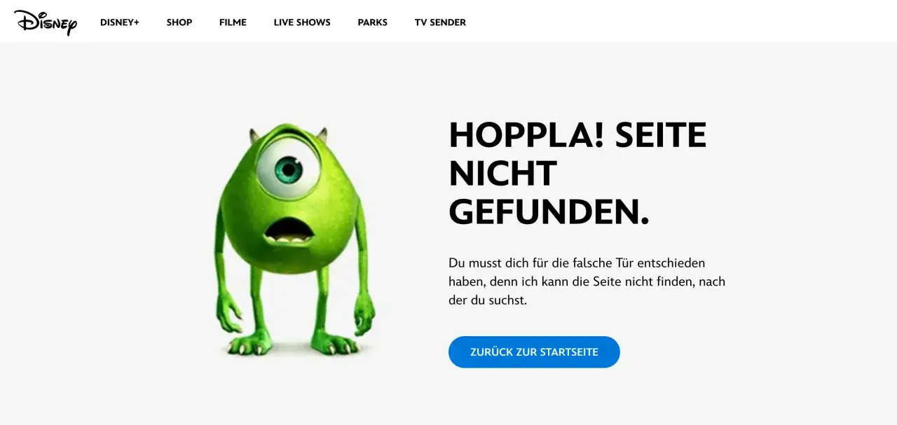 Mike Wazowski, der gr&uuml;ne Monster-Charakter, zeigt auf eine 