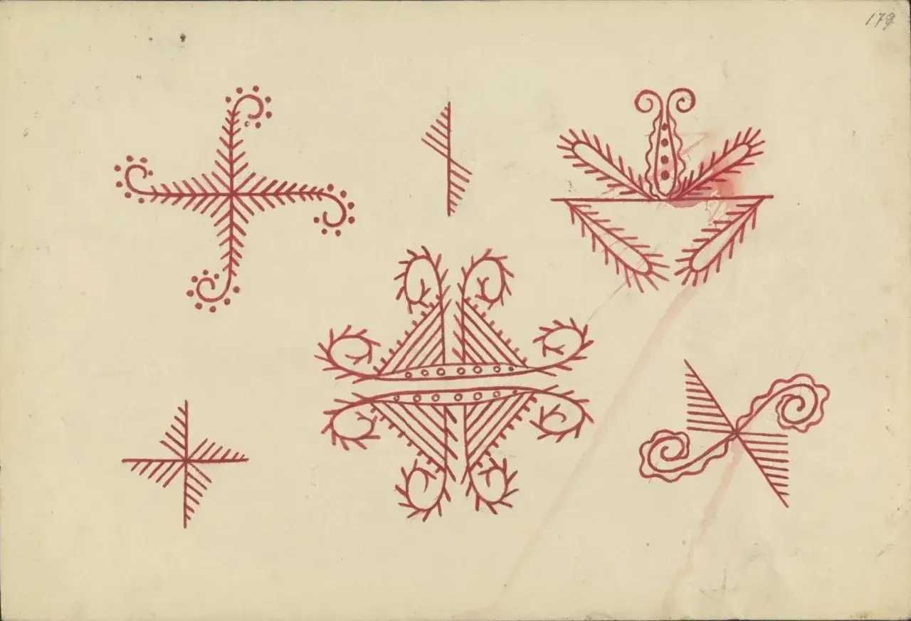 Rysunki przedstawiają symbole słowiańskie i ich znaczenie: krzyże, gwiazdy, spirale, roślinne ornamenty.