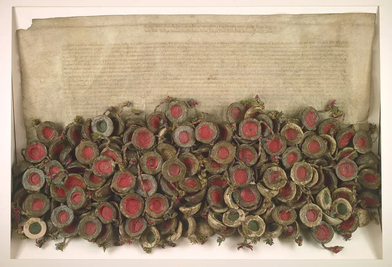 Stary dokument z licznymi pieczęciami, symbolizujący historyczną konfederację warszawską.