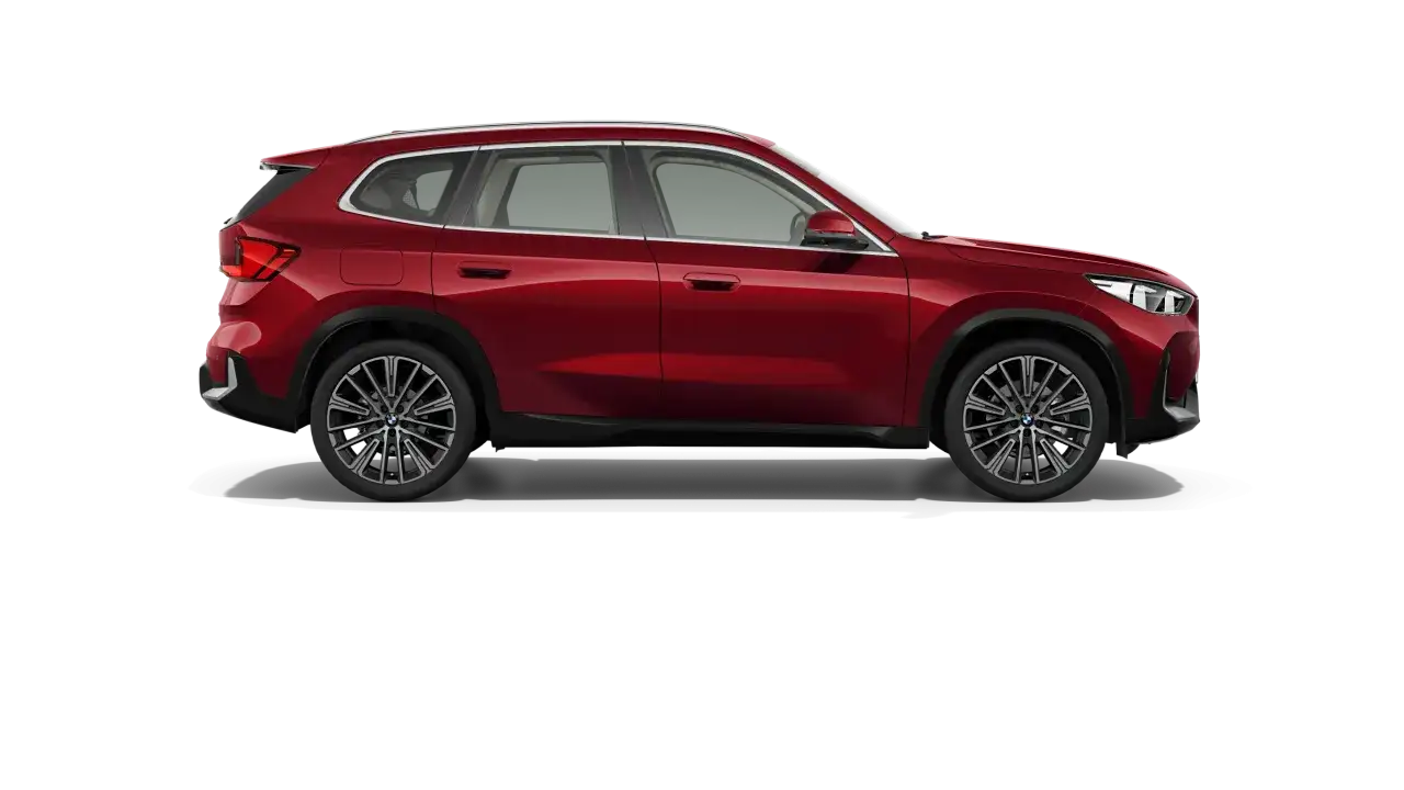 Czerwony BMW X1 z profilu. Poznaj jego imponujące bmw x1 wymiary i nowoczesny design.