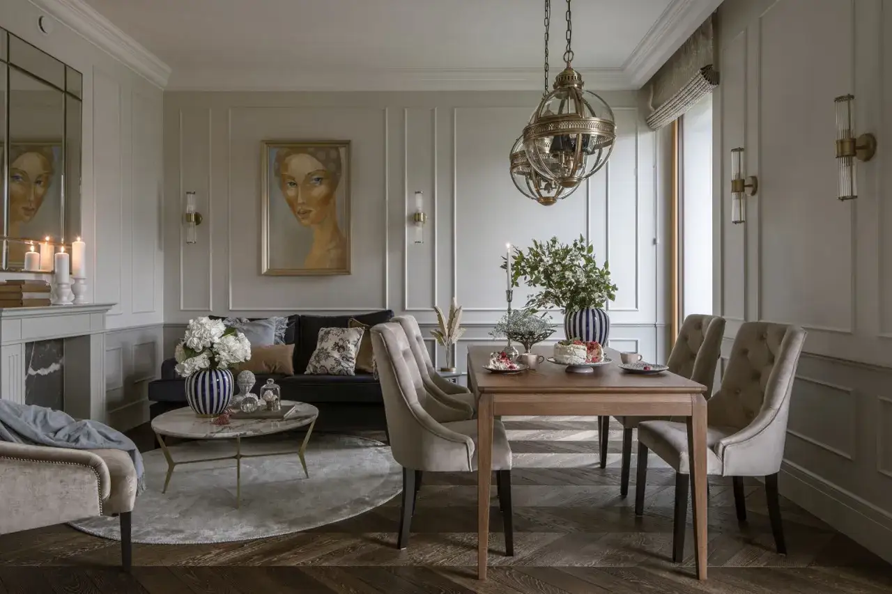 Elegancki salon z jadalnią, gdzie zasady feng shui widać w harmonii kolorów i rozmieszczeniu mebli.
