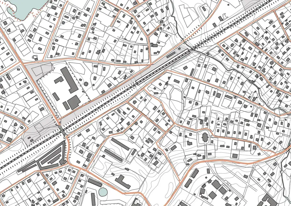 Mapa przedstawia szczegółowy profil terenu z zabudowaniami, drogami i liniami kolejowymi.