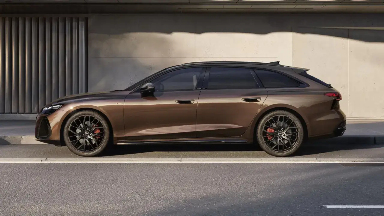 Eleganckie Audi A6 Avant w kolorze brązowym, z czarnymi felgami i czerwonymi zaciskami hamulcowymi. Sprawdź aktualną audi a6 cena.