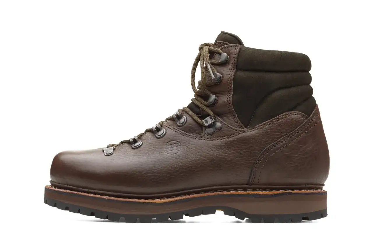 A sturdy brown hiking boot, crafted from durable yak leather, featuring a padded collar and rugged sole.