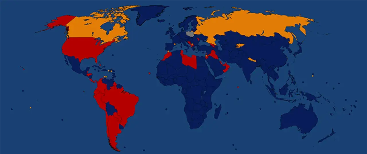 Mapa świata z zaznaczonymi krajami. Czerwone i pomarańczowe obszary to miejsca, gdzie nie jechać.
