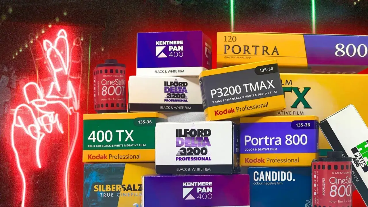 A collection of film rolls, including CineStill 800T, a great choice for the best 35mm film for low light.