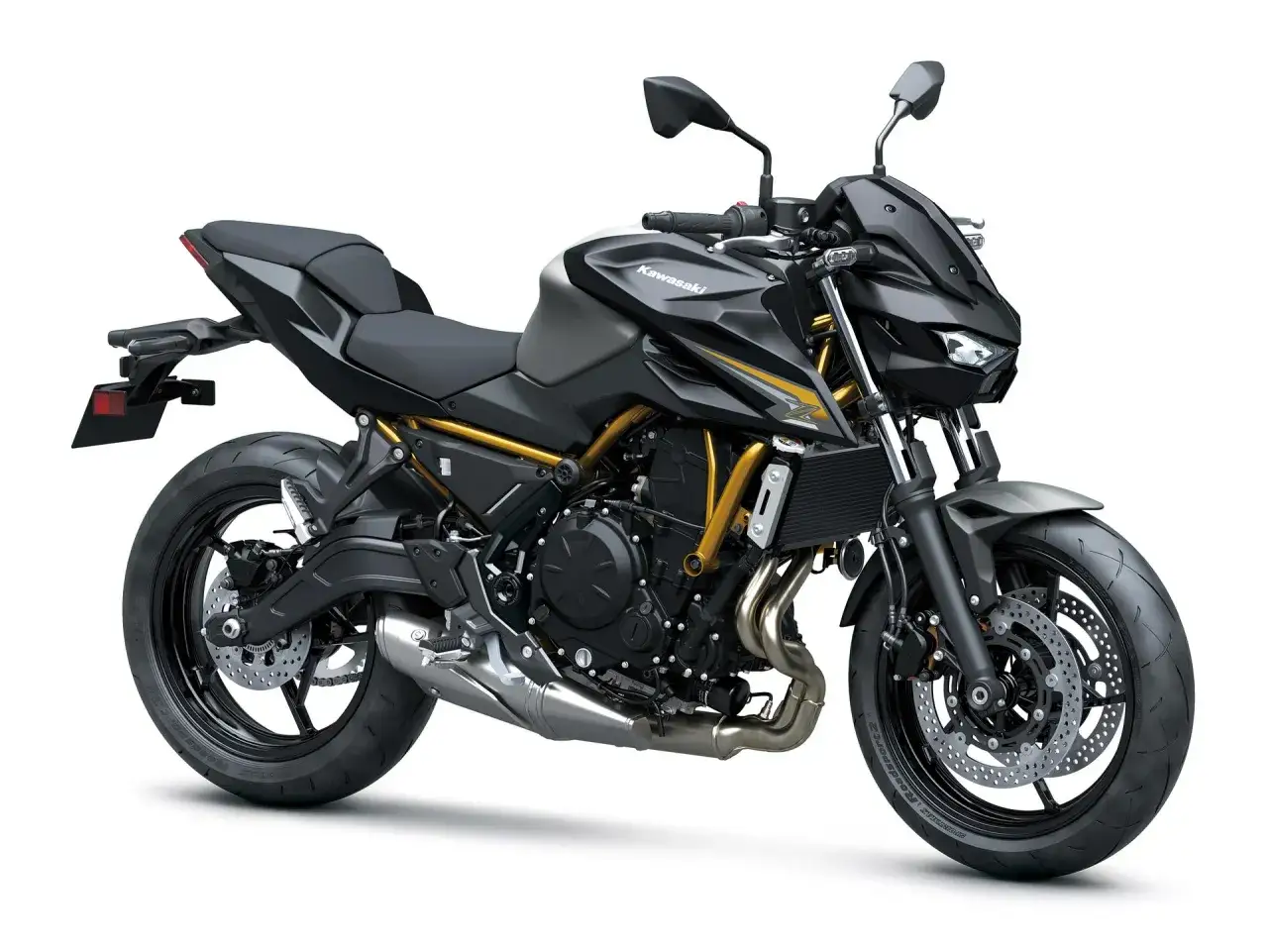 Kawasaki z650 cv negra con detalles dorados, lista para la aventura.