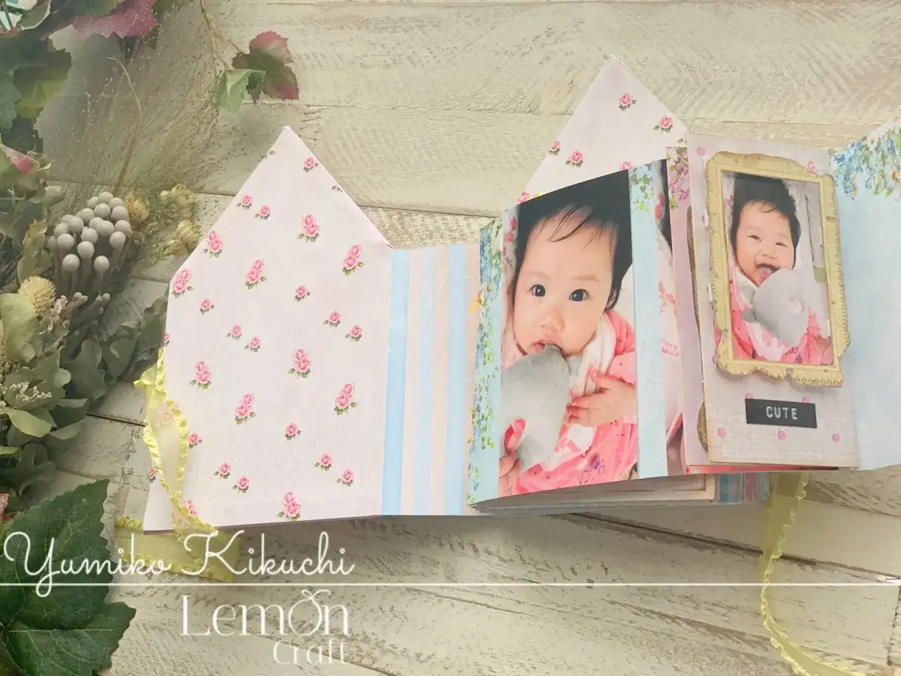 Uroczy albumik z dziecięcymi zdjęciami, pełen słodkich scrapbooking pomysł&oacute;w. R&oacute;żane wzory i pastelowe kolory tworzą bajkową atmosferę.
