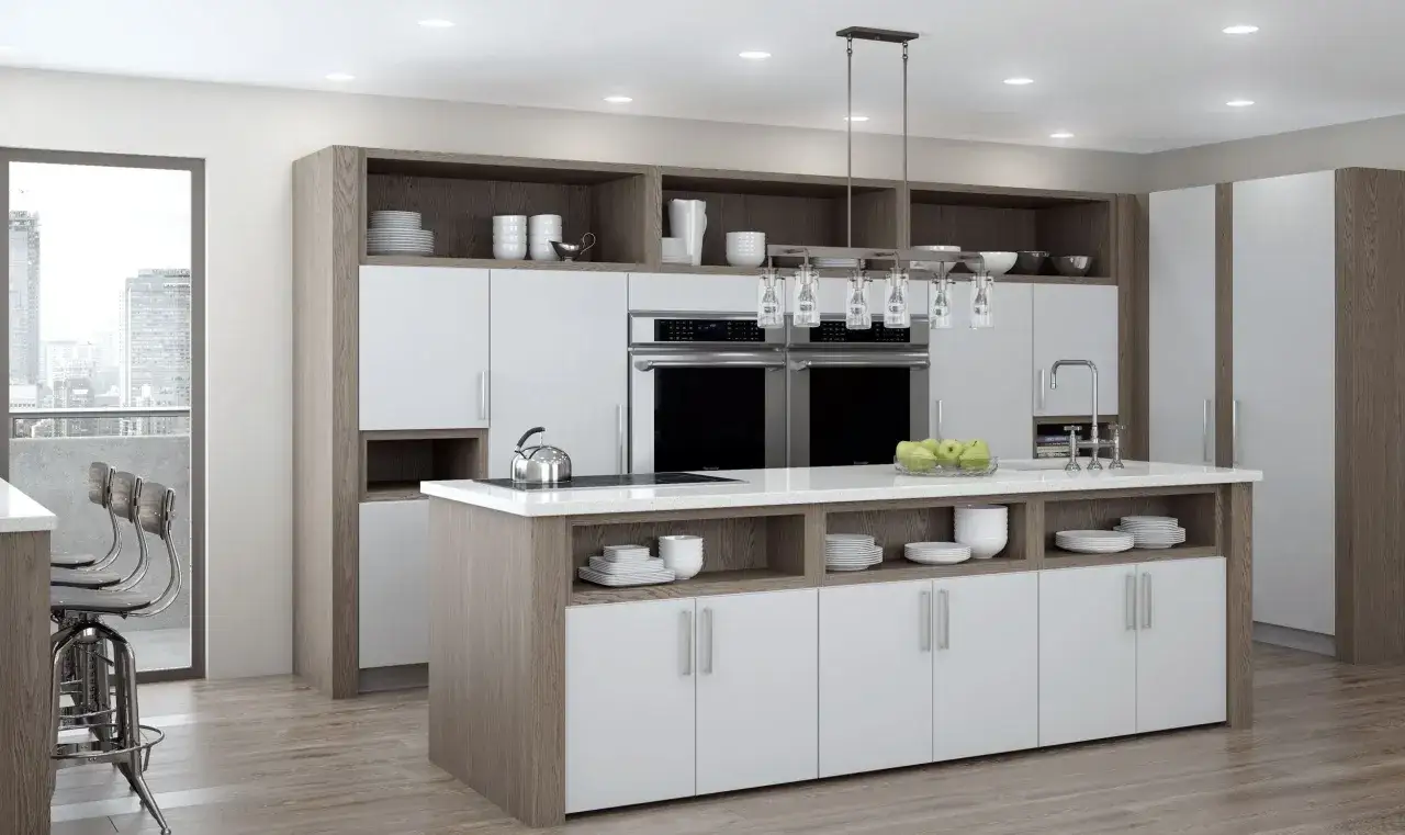Cocina moderna con gabinetes de melamina que es un material duradero y f&aacute;cil de limpiar. Isla central con electrodom&eacute;sticos integrados y vista a la ciudad.