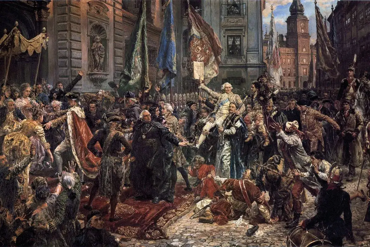Tłum świętuje, unosząc kr&oacute;la. Sztandary i okrzyki tworzą hymn do miłości ojczyzny.