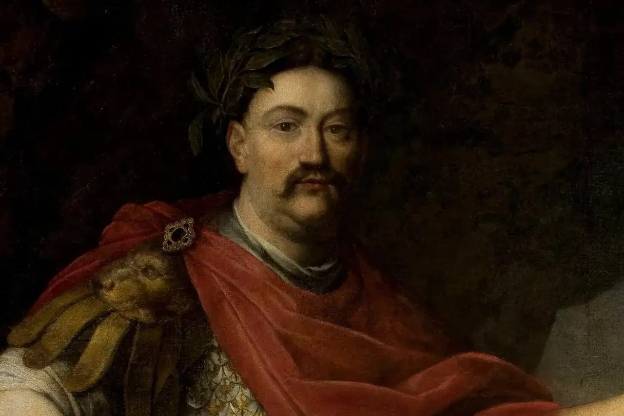 Portret władcy z wieńcem laurowym, symbolizujący potęgę i chwałę, wpisujący się w polskie mity narodowe.