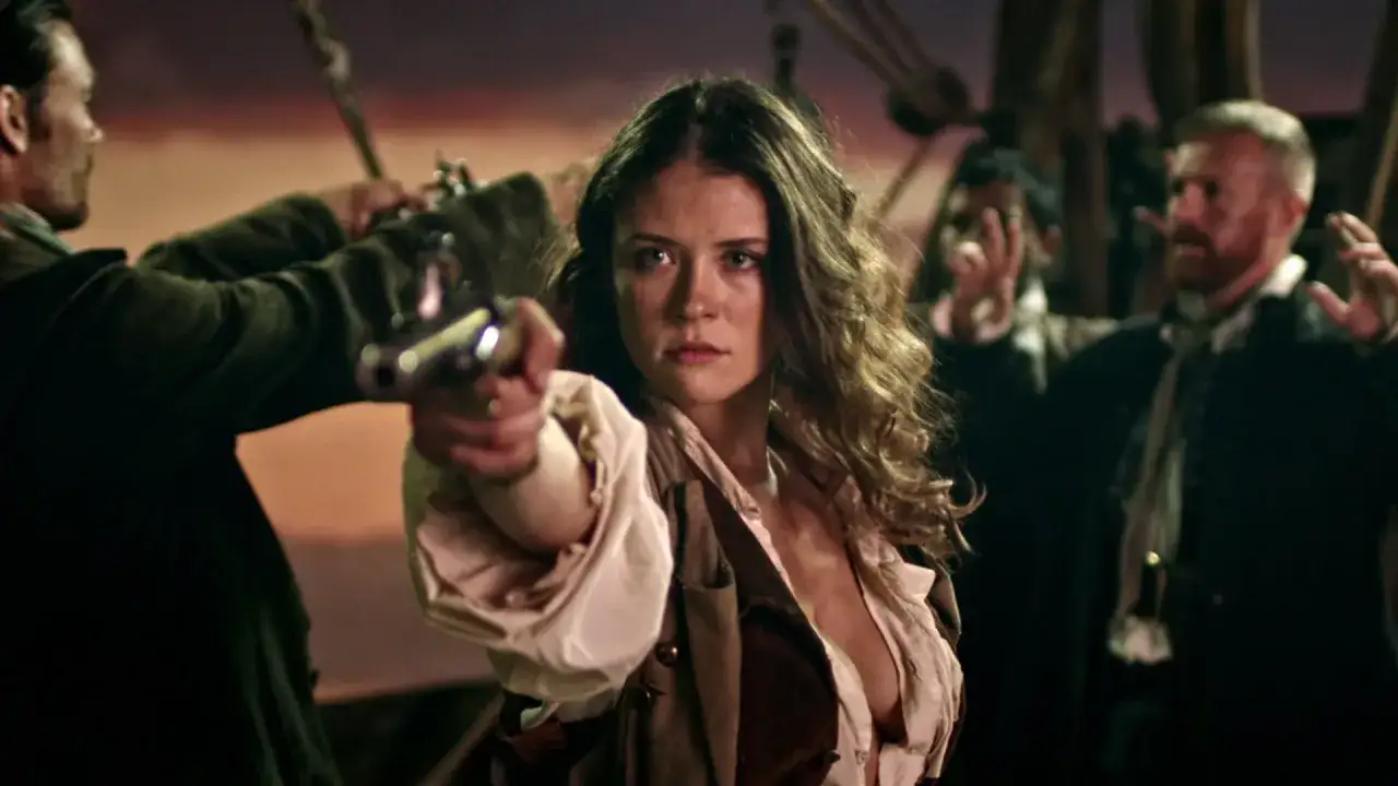 Młoda piratka celuje z pistoletu, broniąc swojego zaginionego królestwa piratów.