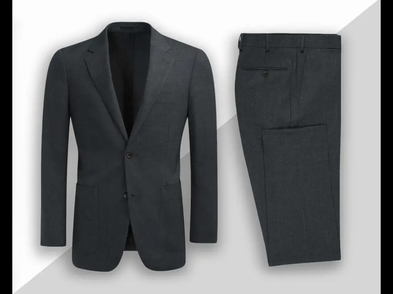 A dark grey suit, likely a Havana suit, with a two-button jacket and matching trousers.