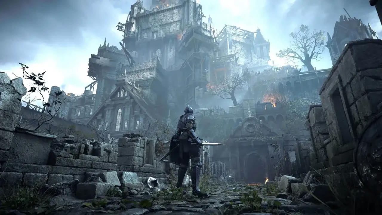 Rycerz w zbroi stoi przed ponurym zamkiem, gotowy do walki o **demon's souls**.