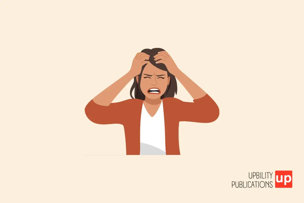 Donna disperata si tiene la testa, forse per il troppo stress o per capire le cause di un problema.