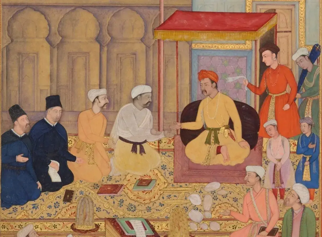 A scene from Mughal miniature paintings depicting a royal court. A seated figure in yellow receives a scroll from a standing figure in orange.
