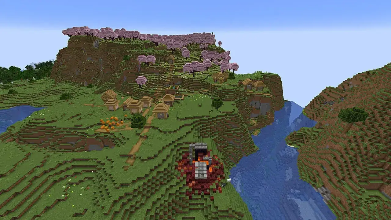 Un pueblo en la cima de una colina con &aacute;rboles de cerezo, perfecto para las mejores semillas Minecraft. Un pozo de lava en el borde del acantilado.