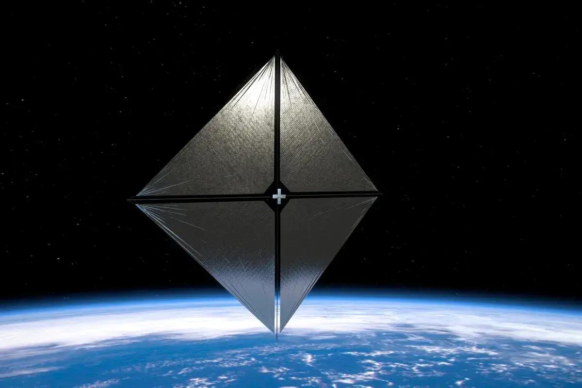Kosmiczny żagiel projektu Breakthrough Starshot, unoszący się nad Ziemią, symbolizuje przełom w eksploracji kosmosu.