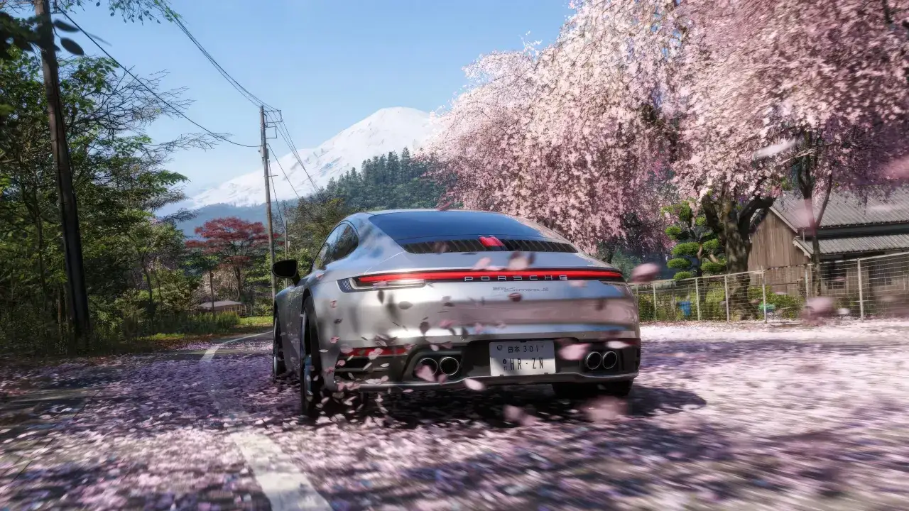 Porsche 911 na tle kwitnącej wiśni i ośnieżonej g&oacute;ry. Czy to zapowiedź forza horizon 6?