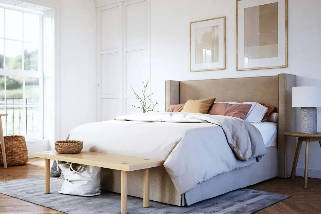 A serene bedroom with a large bed, perfect for a good night's rest. Even with just six hours of sleep, you'll feel refreshed in this inviting space.