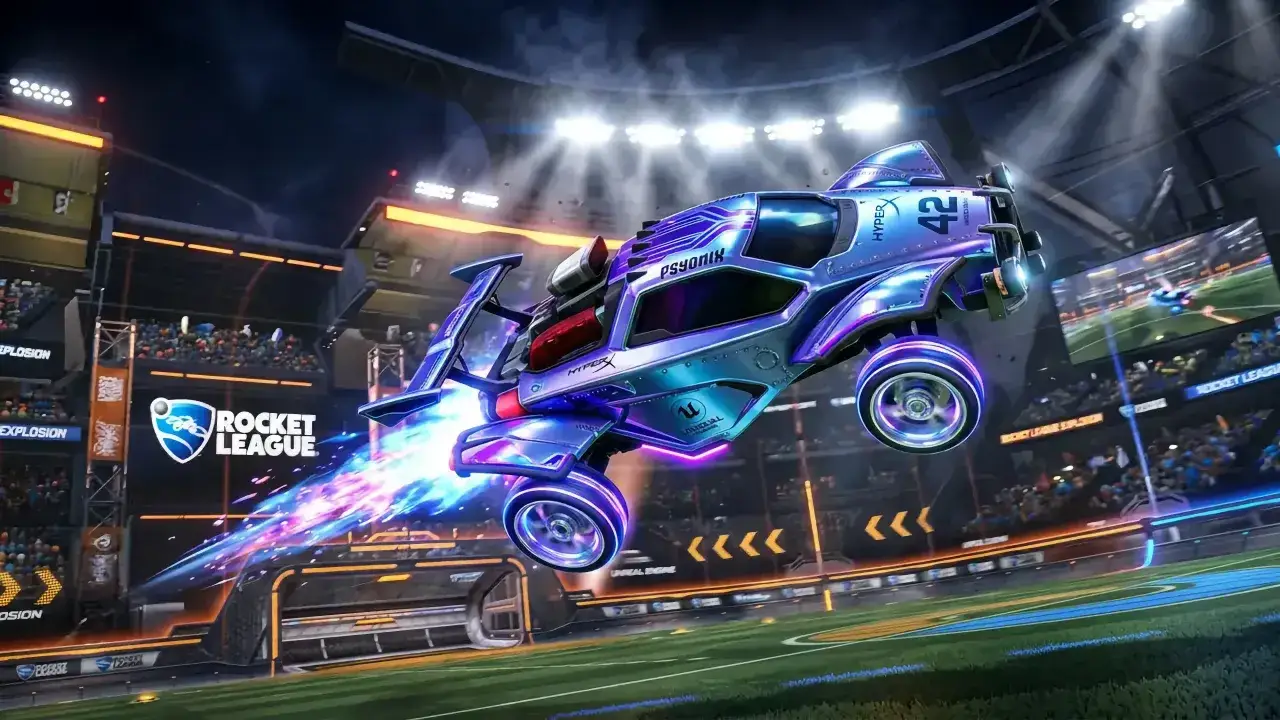 Niebieski samochód Rocket League z numerem 42 na dachu, unoszący się w powietrzu z niebieskim płomieniem, na tle stadionu. Grafika w stylu Unreal Engine 6.