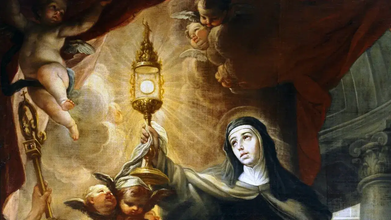 11 sierpnia. Święta Teresa z Ávili trzyma monstrancję, otoczona przez aniołki i cherubinów.