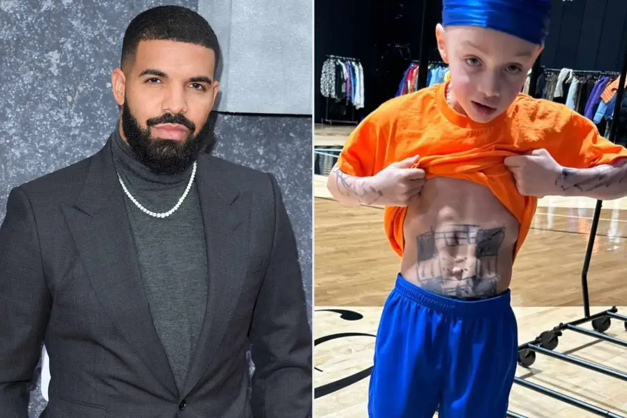 Drake i jego syn, kt&oacute;ry pokazał rysunek na brzuchu.