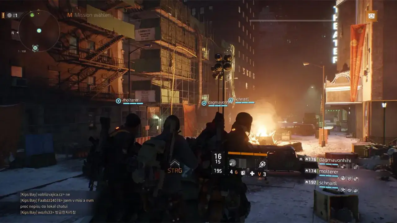 Gracze w grze The Division przygotowują się do misji w zniszczonym mieście nocą.