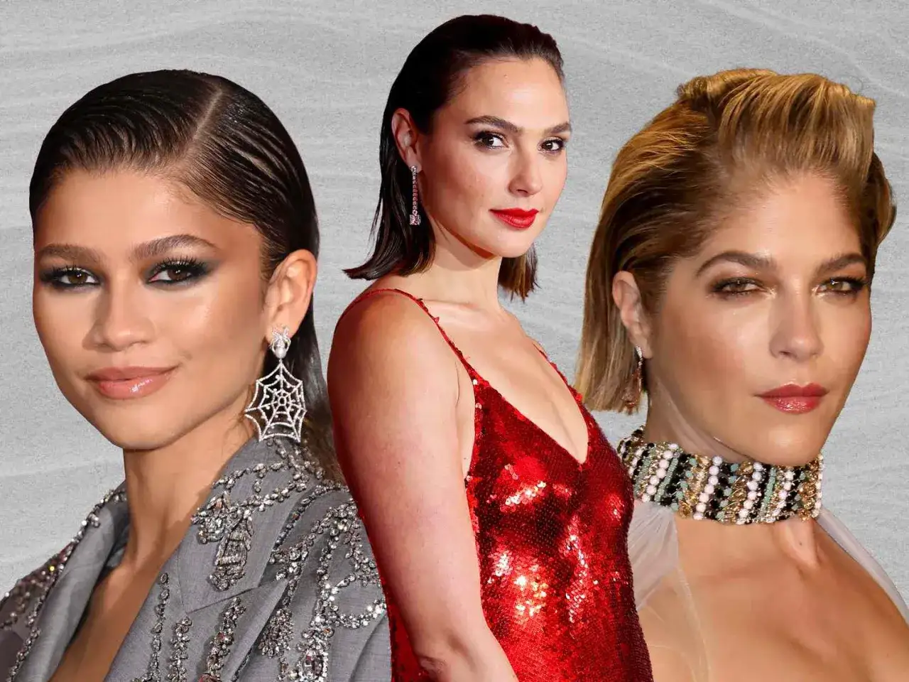 Drei Frauen mit elegant zurückgekämmten Haaren: Zendaya mit Spinnenohrringen, Gal Gadot in Rot und Selma Blair mit auffälligem Collier.