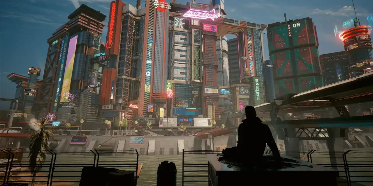 Silueta de un personaje contemplando la imponente ciudad de **Cyberpunk 2077 Phantom Liberty**, llena de rascacielos y neones.