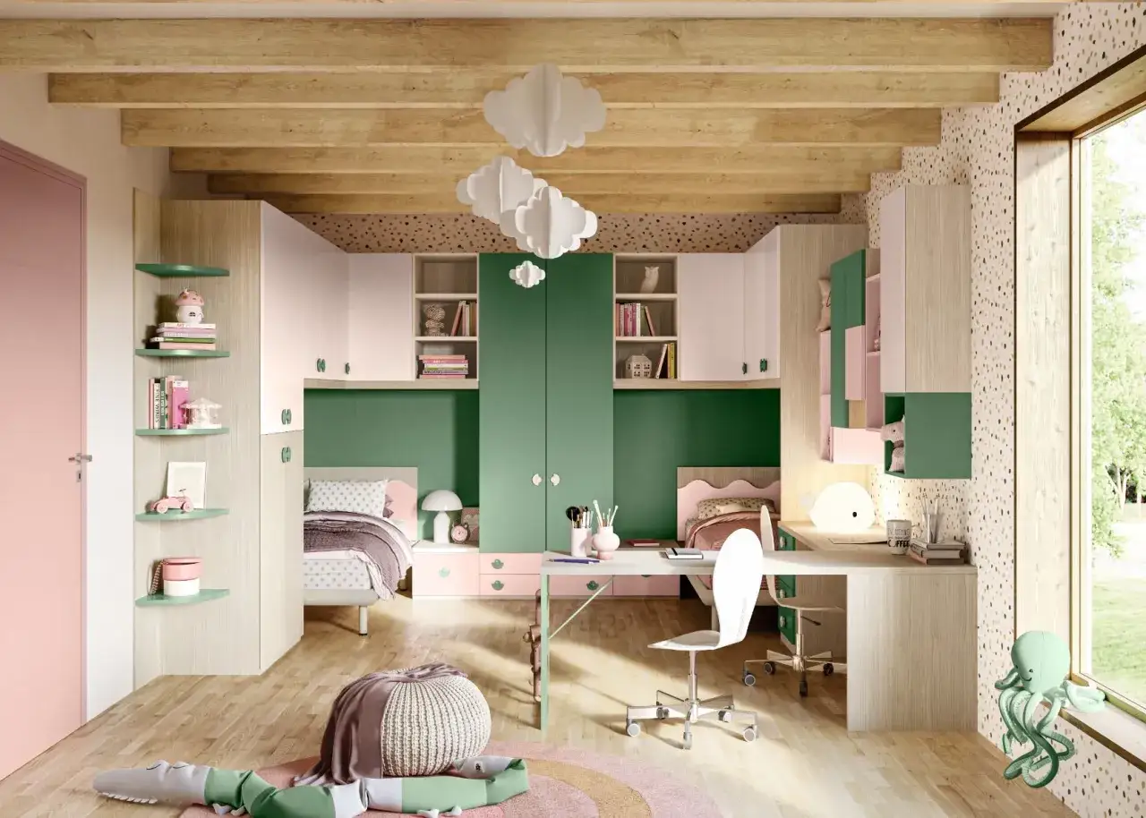 Camere moderne per ragazze con letti, scrivanie e armadi in tonalità pastello e verde bosco. Un ambiente sognante e funzionale.